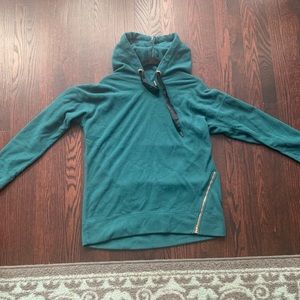 Teal fleece hooded sweater.